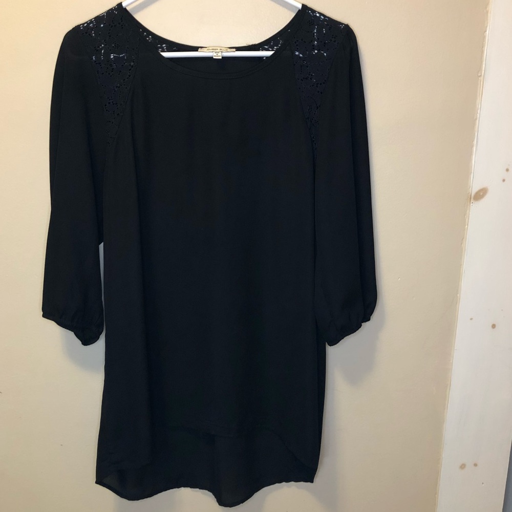 Sheer black dress with lace detailing